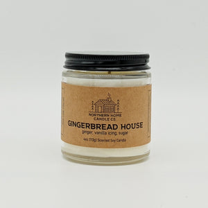 
                  
                    Load image into Gallery viewer, Soy candle with a brown label that reads gingerbread house, ginger, vanilla icing, and sugar. White background. 
                  
                