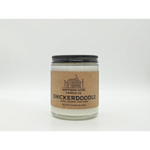 
                  
                    Load image into Gallery viewer, 8 ounce soy candle with brown label that reads northern home candle and snickerdoodle. 
                  
                