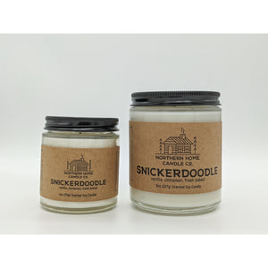 
                  
                    Load image into Gallery viewer, A 4 ounce and an 8 ounce soy candle that both have brown labels and both read northern home candle and snickerdoodle.
                  
                