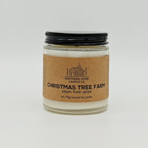 
                  
                    Load image into Gallery viewer, Soy candle with brown label that reads northern home candle and Christmas Tree Farm surrounded by a white background. Label also reads balsam, fraser, and spruce.
                  
                